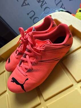 PUMA Attacanto FG/AG Junior Soccer Cleats Glowing Coral/Puma Black